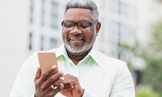 Man holding a smartphone.